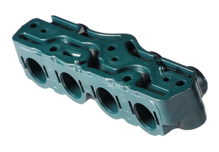 Ventilblock aus Duroplast für Hydraulikanwendungen: komplexes Formteil mit Bohrungen und Funktionsflächen
